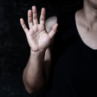 Woman holding up her hand