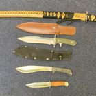 Six knives of various sizes