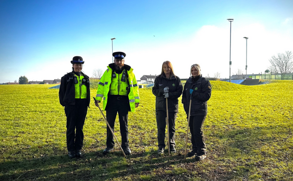 Four people on a weapon sweep