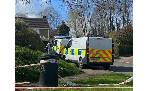 Police van at scene guard
