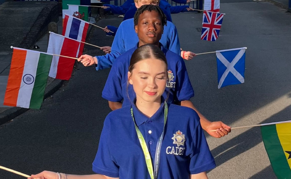 Cadets waving flags for the Luton Carnival