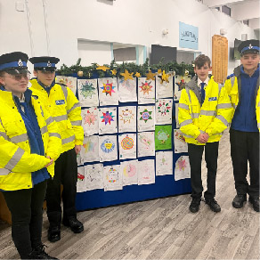 Police cadets with Christmas messages from school children