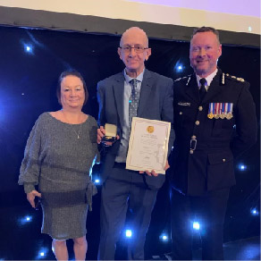 David Darnell receiving his bravery award with Trevor Rodenhurst