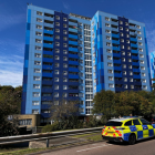 Police car outside block of flats