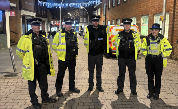 Five officers and Christmas lights