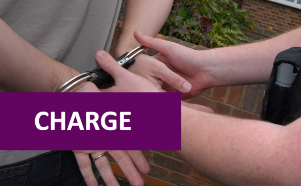 Person in handcuffs
